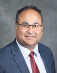 Dr. Amish Raval