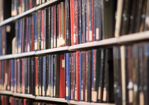 Library shelves with journals and books